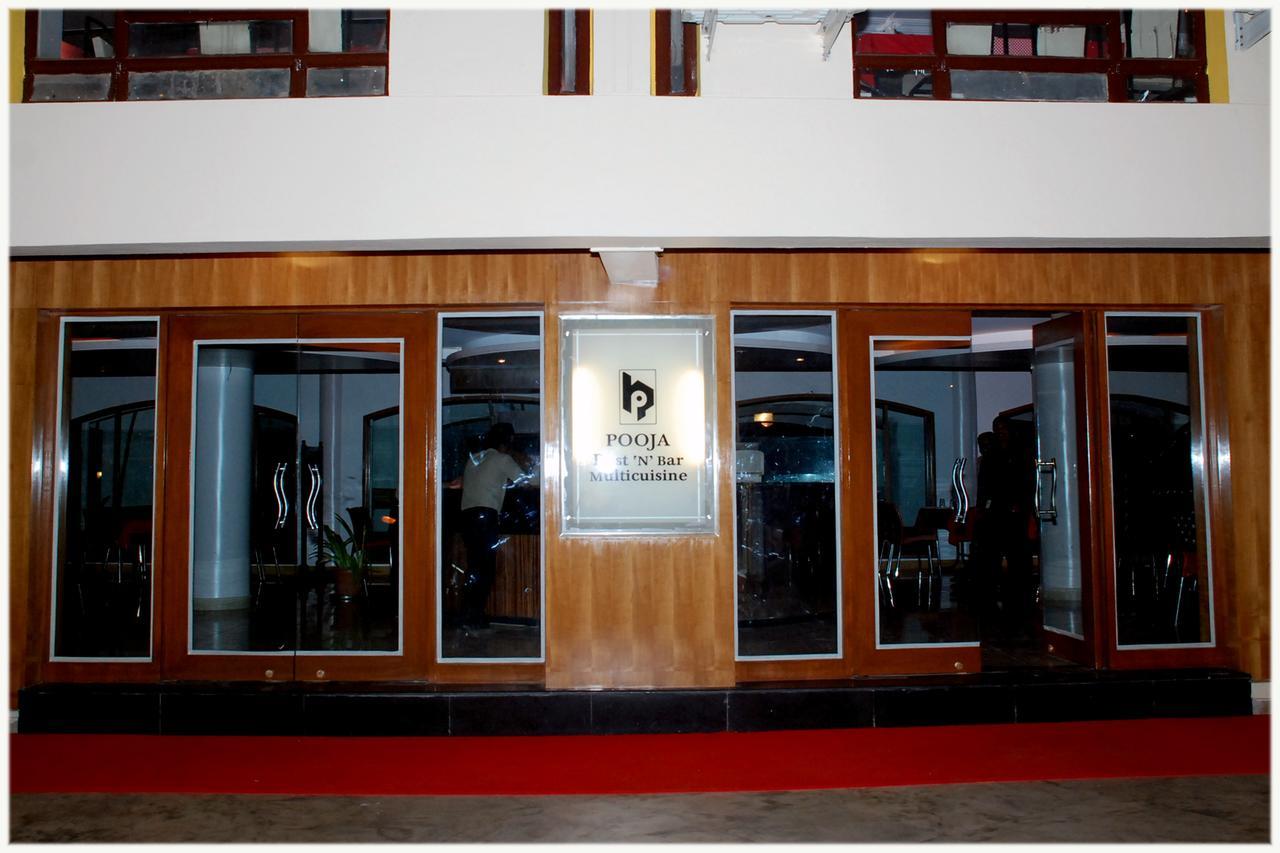 Hotel Pooja International Davangere Bagian luar foto